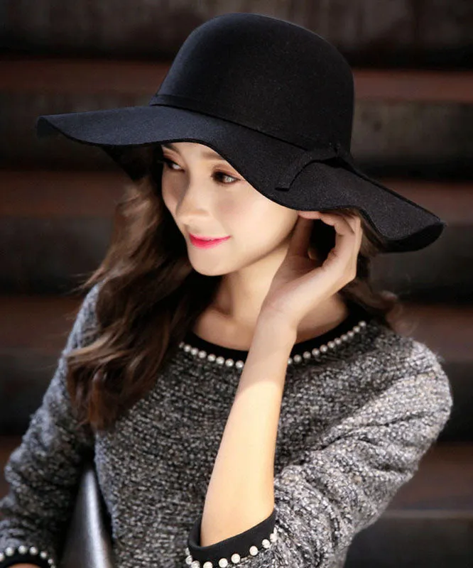 Stylish Mulberry Wave Brim Bow Woolen Cloche Hat